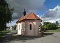 Socha sv. Jana Nepomuckého u závěru stejnomené kaple