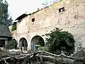 Torzo východního křídla s ambity ve dvoře