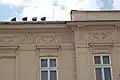 Korunní římsa s ozdobným pásem