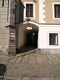 Fotografie z Velkého náměstí na průchod Klášterní ulice v Prachaticích