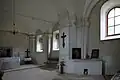 Pohled z lodi do presbytáře v roce 2019