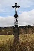 Kříž před vesnicí u bývalé cesty na Mašov