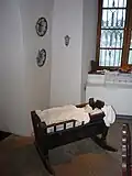 dřevěná kolébka z Vysočiny