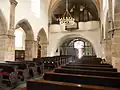 Interiér hlavní lodi od presbytáře