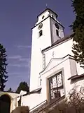Hlavní vstup na starý netínský hřbitov ve směru centra od vsi.