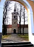 Vstupní brána do areálu kostela Svatého Ducha v Římově