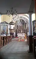 Kostel sv. Víta zevnitř při velikonoční bohoslužbě