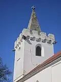 kamenné chrliče na věři kostela ve Stolanech