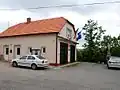 Obecní úřad, hasičská zbrojnice a socha svobody