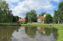 Náves s kostelem Nanebevzetí P. Marie