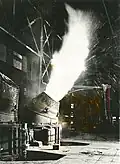 Bessemerův konvertor v provozu v ocelárně Lackawanna v New Yorku