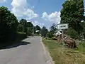 Tabule při vjezdu do obce