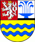 Znak městyse Lázně Toušeň