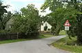 Silnice ve Lhotě směrem k Vlasenici