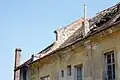 Rubová strana mladší přístavbou zakrytého barokního východního štítu