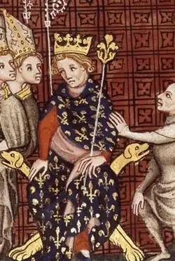 Na ilustraci je vyobrazen východofranský král Ludvík II. Němec sedící v modro-žlutém rouchu s korunou na hlavě a žezlem v ruce. Zleva je obklopen dvěma preláty.