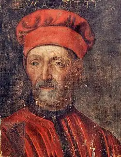 Věkem poškozený portrét staršího muže s šedou bradkou a knírem v červeném oděvu v červeném čepci