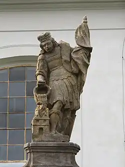 Detail sochy sv. Floriána u kostela v Malém Březně