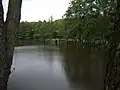 Hráz nádrže Malý Jordán s výpustí k Jordánu