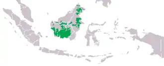 rozšíření orangutana bornejského (zeleně)