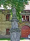 Socha před farou