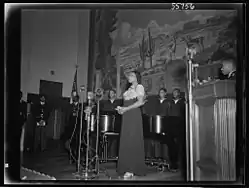 Marian Anderson at the ceremony held in the auditorium of the U.S. Department of the Interior at the dedication of a mural painting commemorating a free public concert given by her on the steps of the Lincoln Memorial on Easter Sunday, 1939