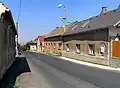 Domy u silnice směrem k lázním Mšené