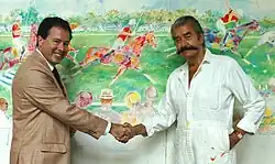 David McLane (vlevo) a LeRoy Neiman (vpravo)
