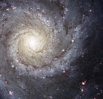 Messier 74, nejjasnější galaxie ve Skupině galaxií M74. Autor: ESA/NASA.