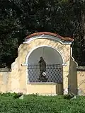Poklona svatému Janu Nepomuckému před zámkem