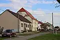 Stále poškozená fasáda radnice