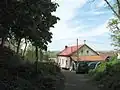 Domy v obci Korozluky na úpatí Jánského vrchu