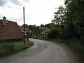 Domy za zatáčkou