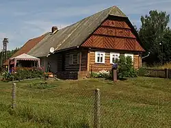 Nová Ves nad Popelkou, bývalá kovárna s roubenou stodolou čp.30.jpg