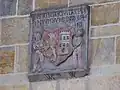 Znak města na radnici