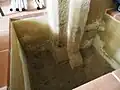 Oblázková dlažba v místech ukončení portálu (Cippusův dům)