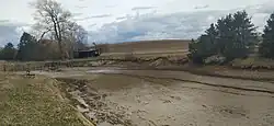 Plesenský potok, rybník pod pramenem