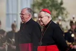 Antoine Hérouard (vlevo) a kardinál André Vingt-Trois (Elysejský palác, 2012)
