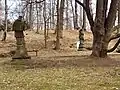 Sochy sv. Jana Nepomuckého a sv. Barbory v zámeckém parku