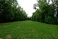 Nedokončená část dálničního náspu v Brně-Bystrci, později upravená jako malý park
