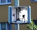 Vnitřek hodin s chybějícím ciferníkem v Počernické ulici v Malešicích