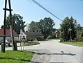 Autobusová zastávka v centru vesnice
