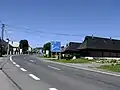 Obec Podbiel, evropská silnice E77 (v trase silnice I/59) před křižovatkou