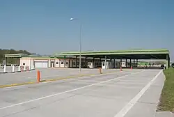 E65, celnice Kúty