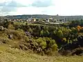 Pohled na Liboc (v pozadí letohrádek Hvězda) přes soutěsku Džbán