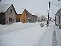 Domky naproti hasičské zbrojnici