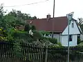 Dům se skalkou