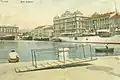 Pohlednice zachycující přístaviště Szapáry a palác Adria
