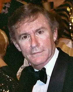 Sedící herec Roddy McDowall, který ztvárnil postavu Cornelia, na fotografii při udílení cen Akademie