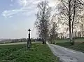 Křížek, Samotín v pozadí